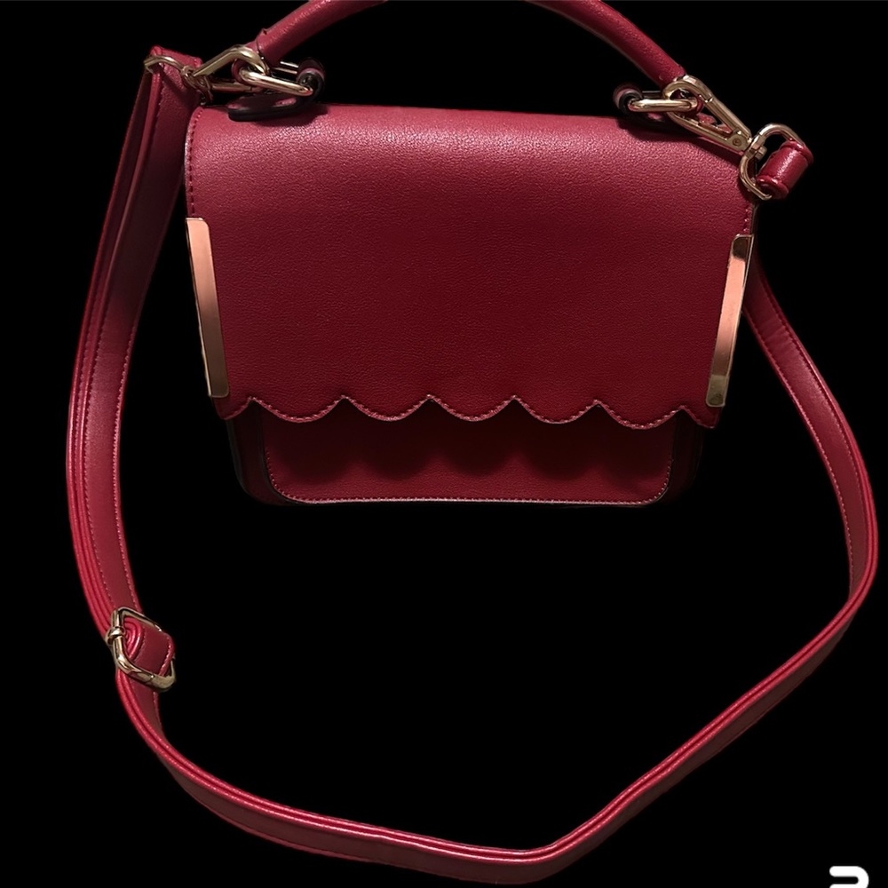 Red purse with long strap